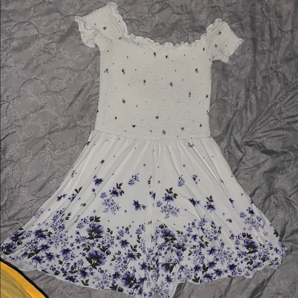 A flower patterned white romper